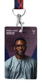 Three City of Umoja staff identification cards suspended from patterned lanyards